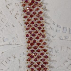 Intricate Red and Gold and White Bracelet with Lattice Design